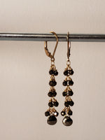 Faceted Pyrite Tear Drop Cascades From Faceted Gemstones on a 14kt. Gold-FilledLever Back Earring.