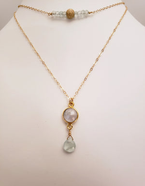 Delicate Bar Necklace Features Faceted Aquamarine Surrounded By a Gold Filled Sparkle Ball to Form a Curved Bar On Gold-Filled Chain Promote Calmness.