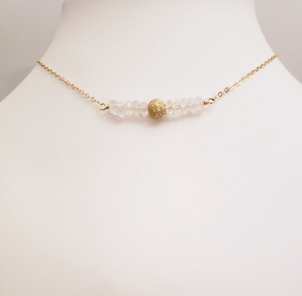 Delicate Bar Necklace Features Faceted Moonstone Surrounded By a Gold-Filled Sparkle Ball To Form On Gold-Filled Chain Enhances Feminine Energy.