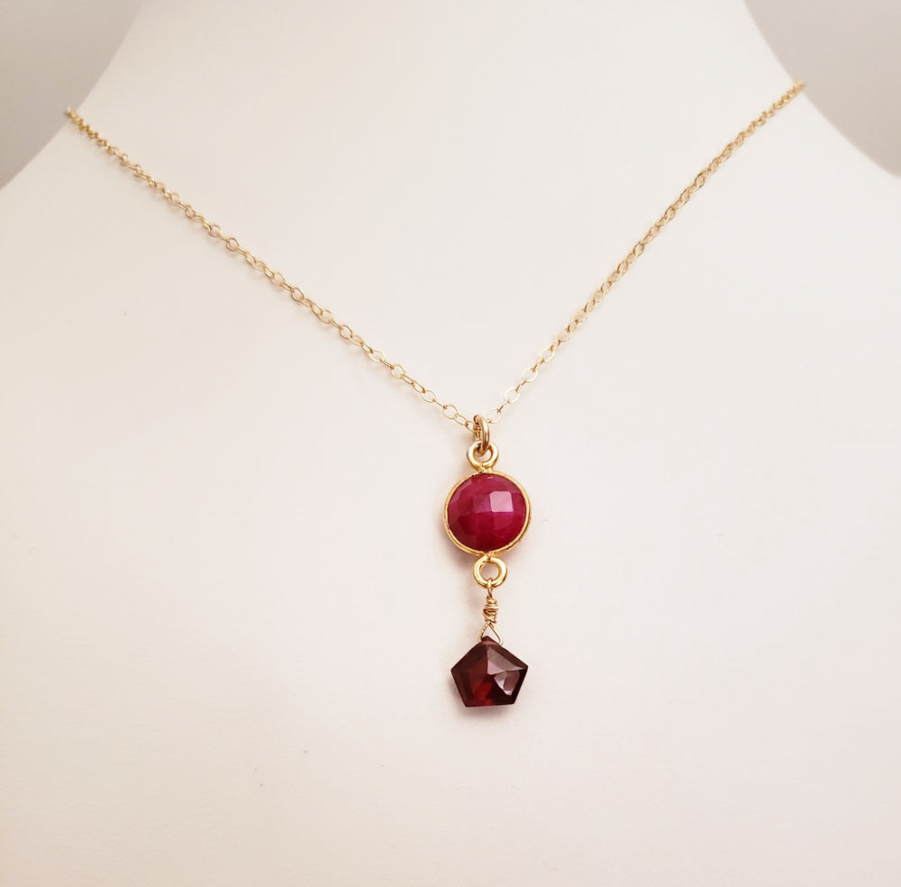 Delicate Pendant Necklace Features a Faceted Bezel Set Ruby With a Faceted Garnet Tear Drop on a Fine Gold-Filled Chain.