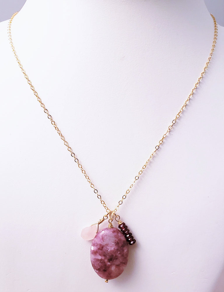 Lepidolite Gemstone Combined with Garnet and Rose Quartz Form a Cluster Pendant Necklace to Alleviate Stress.