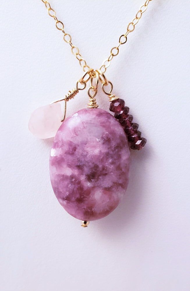 Lepidolite Gemstone Combined with Garnet and Rose Quartz Form a Cluster Pendant Necklace to Alleviate Stress.