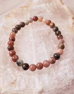 Rhodonite 8MM Beaded Bracelet on Elastic Cord Balances Emotions, Nurtures Love and Encourages Compassion.