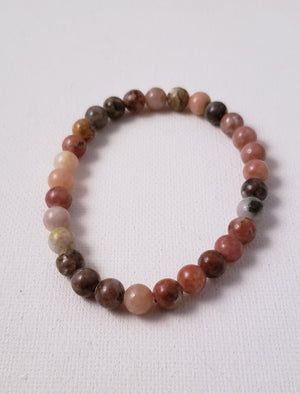 Rhodonite 6MM Beaded Bracelet on Elastic Cord Balances Emotions, Nurtures Love and Encourages Compassion.
