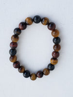 Tiger's Eye Beaded Bracelet on Elastic Cord Creates a High Vibrational and Grounded State.