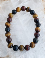 Tiger's Eye Beaded Bracelet on Elastic Cord Creates a High Vibrational and Grounded State.