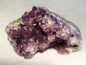 Amethyst Cluster Filled With Amethyst Flowers and Crystal Throughout Raises Spiritual Consciousness.